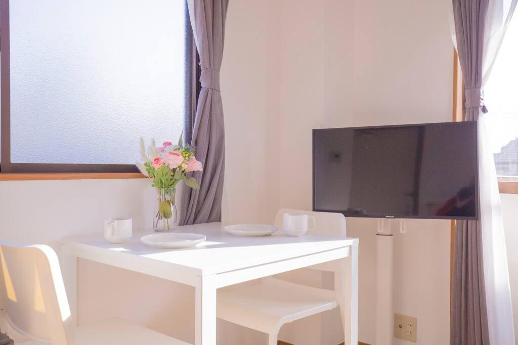 閑静な住宅街_暖かく居心地の良いデザイン Sow-2 Apartment